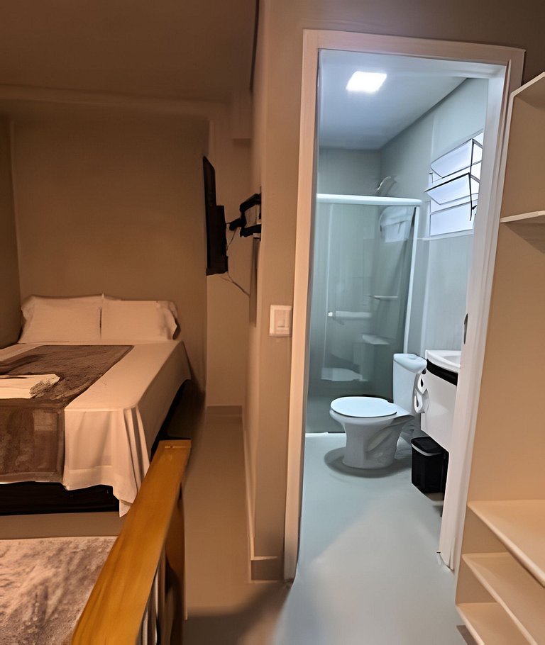 #112 Suíte Mármore Branco c/vaga • Centro