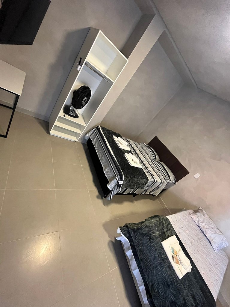 #115 Suíte cama casal e solteiro c/ vaga - Centro