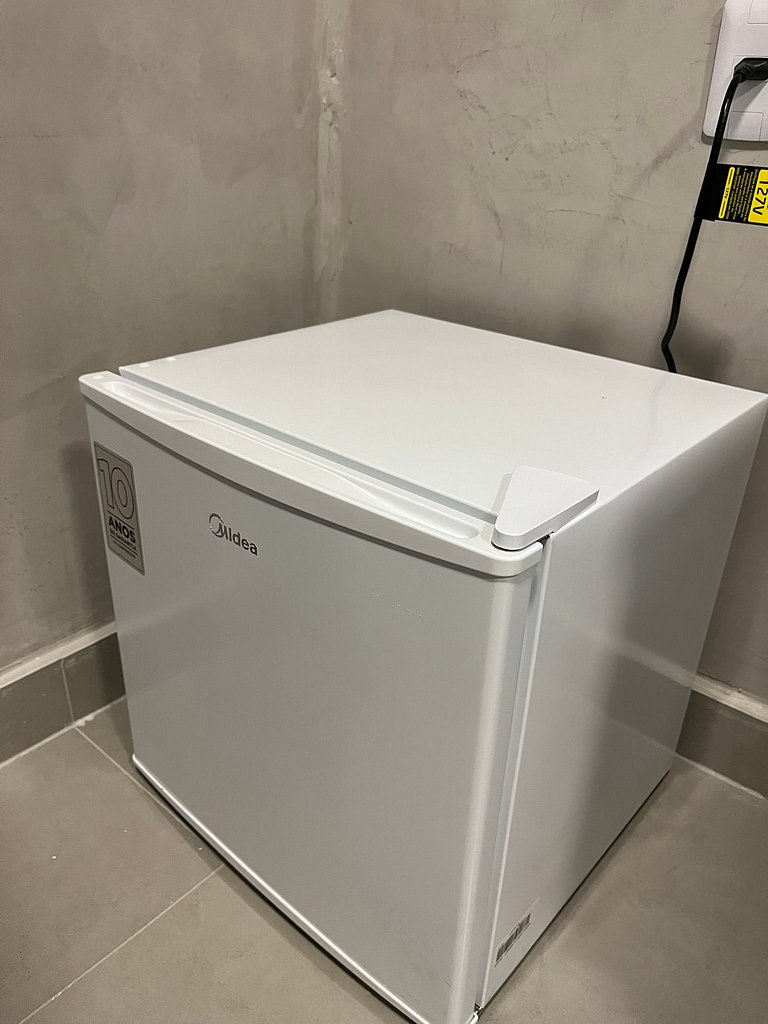 #112 Suíte Mármore Branco c/vaga • Centro