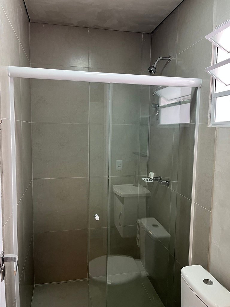 #112 Suíte Mármore Branco c/vaga • Centro