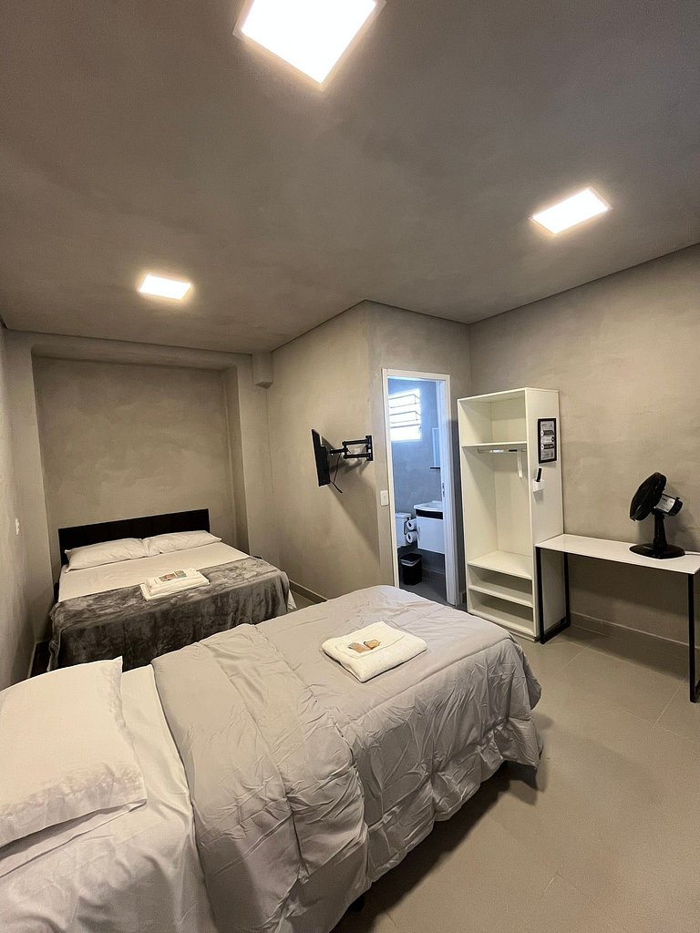 #112 Suíte Mármore Branco c/vaga • Centro