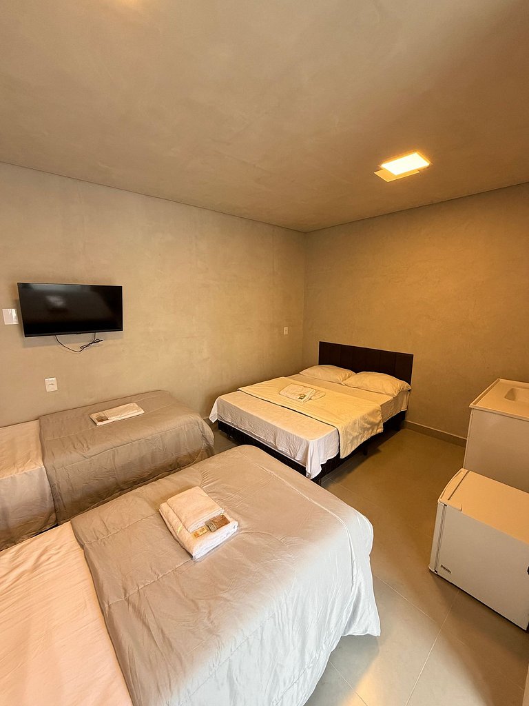 #114 Suíte Bronze Moderno c/ vaga • Centro