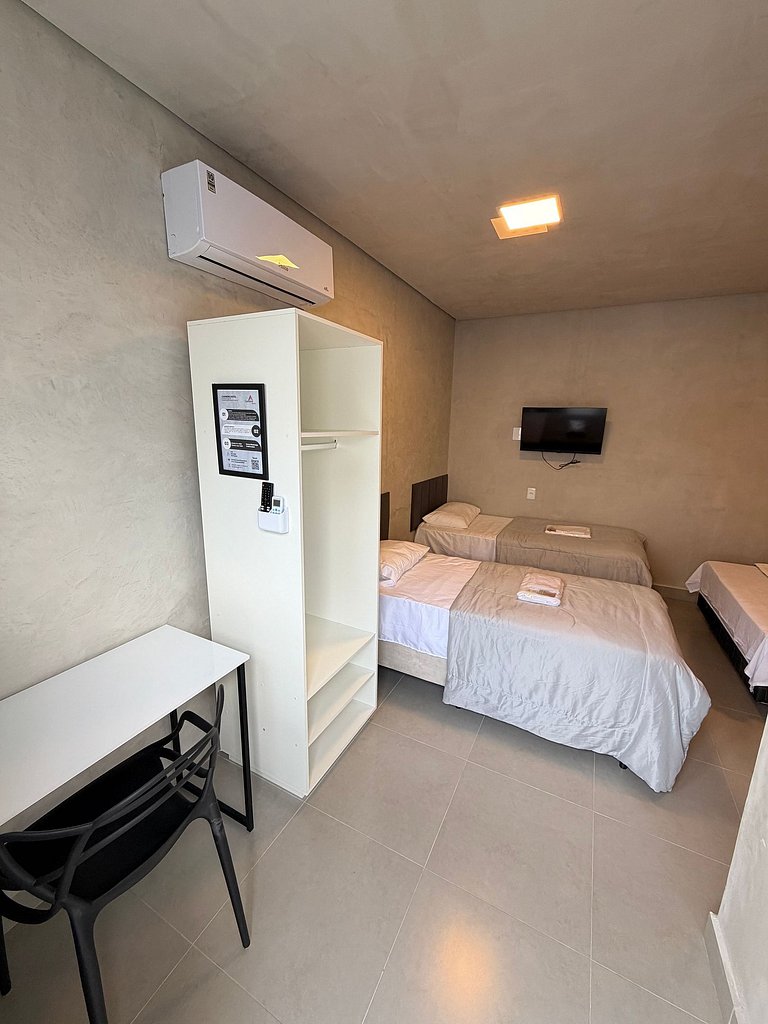 #114 Suíte Bronze Moderno c/ vaga • Centro