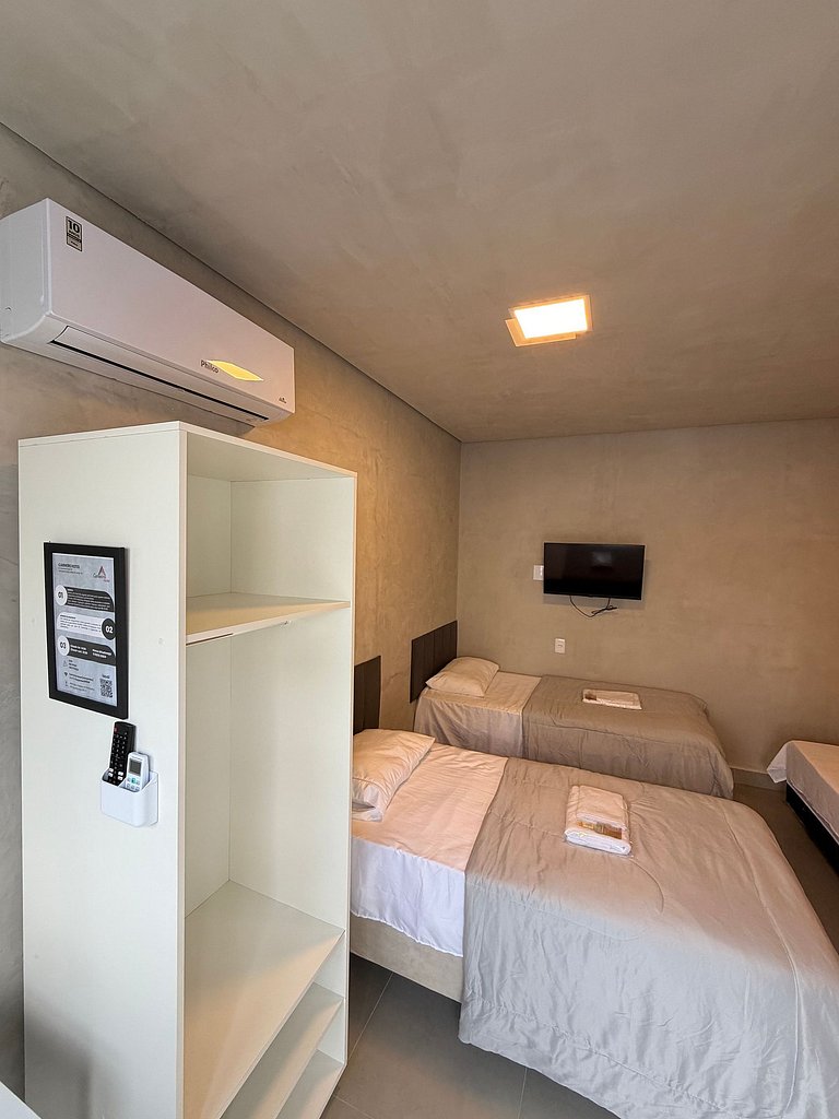 #114 Suíte Bronze Moderno c/ vaga • Centro